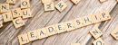 Leadership spelled out in scrabble letters 